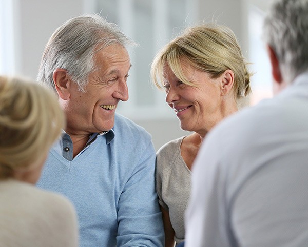 Couple Smiling at each other